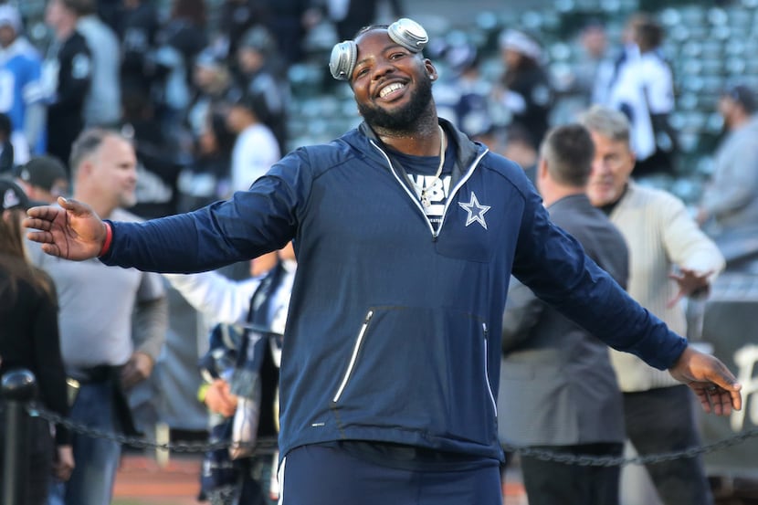 Dallas Cowboys defensive end Daniel Ross (68) is all smiles as he warms up before the Dallas...