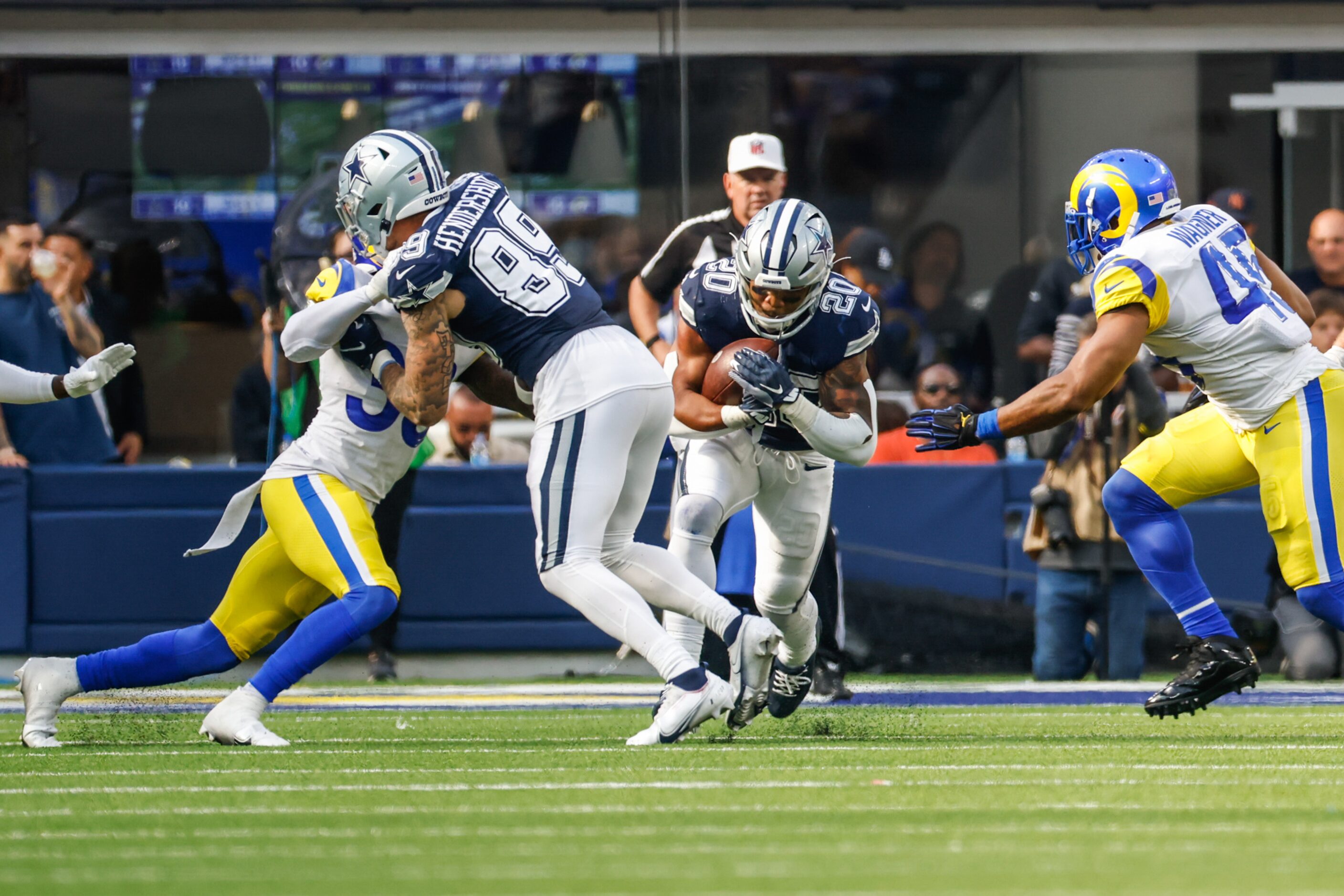 Dallas Cowboys running back Tony Pollard (20) runs the ball against Los Angeles Rams during...