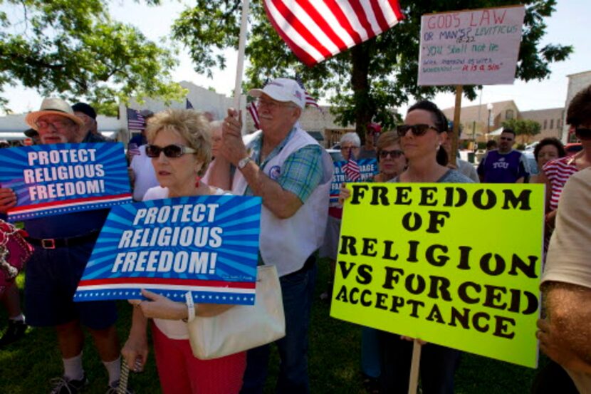  Supporters of Hood County Clerk Katie Lang gather at the courthouse in Granbury, Texas, on...