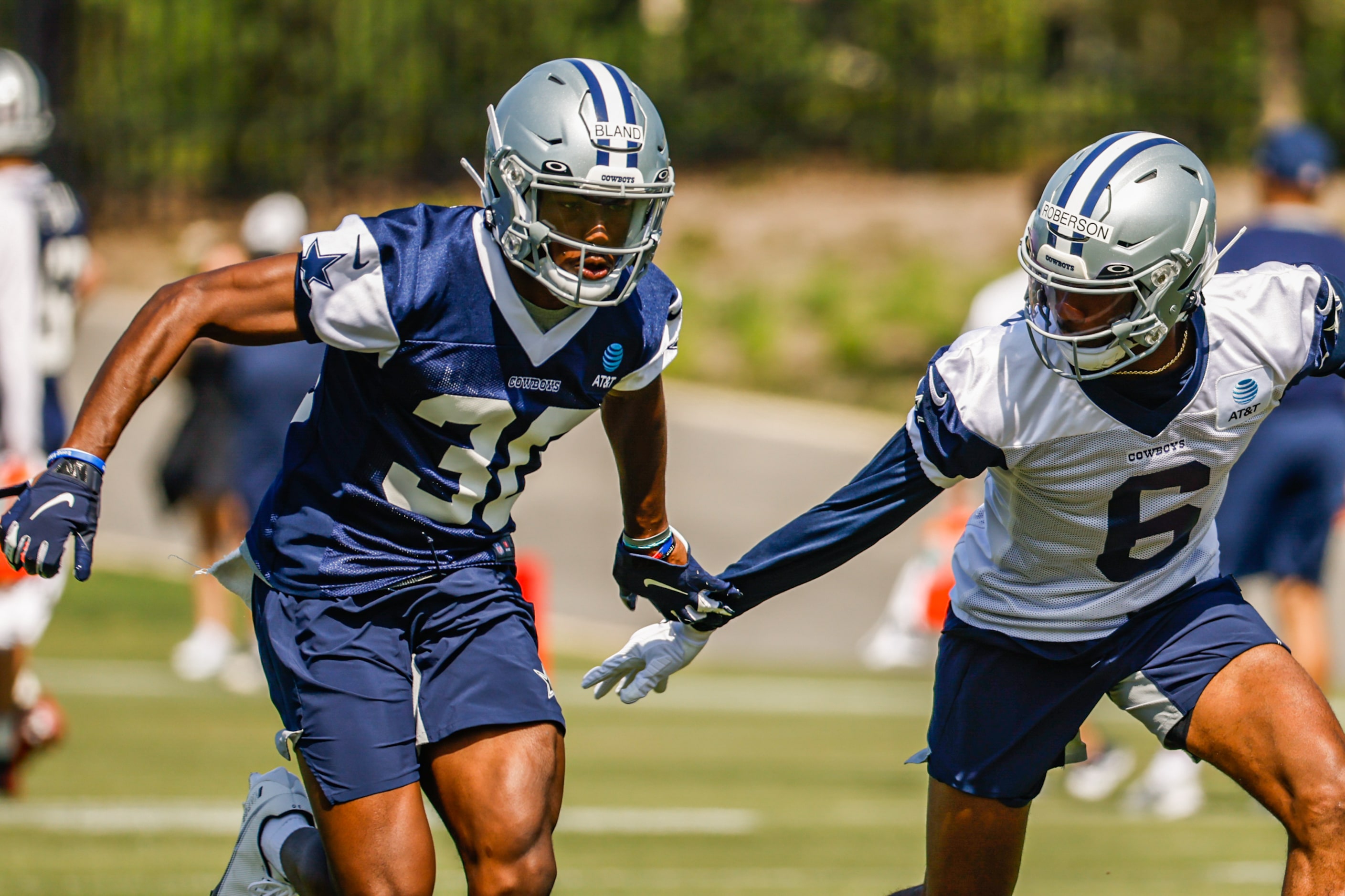 Dallas Cowboys cornerback (30) DaRon Bland and wide receiver (6) Jaquarii Roberson during a...