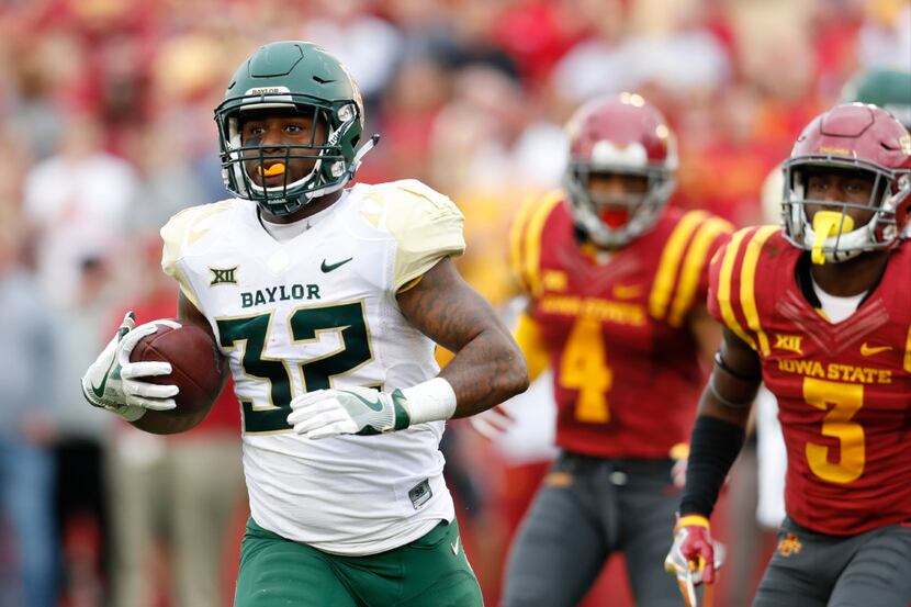 AMES, IA - OCTOBER 1: Running back Shock Linwood #32 of the Baylor Bears drives the ball...