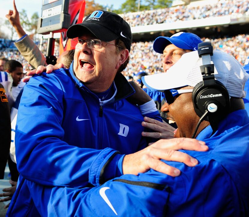 CHAPEL HILL, NC - NOVEMBER 30:  Coach David Cutcliffe of the Duke Blue Devils celebrates as...