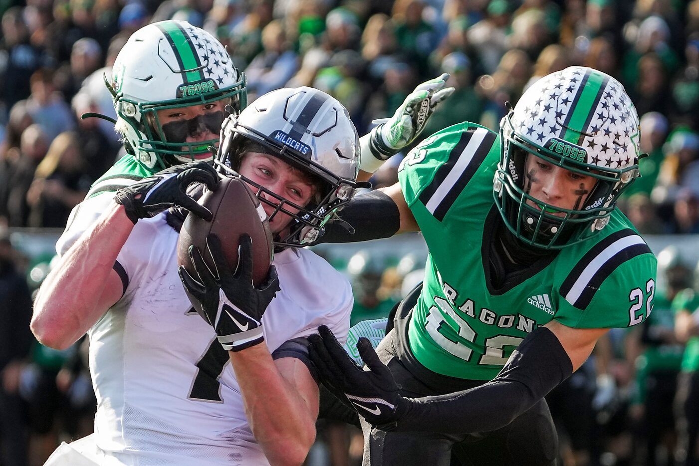 Denton Guyer wide receiver Landon Sides (7) hauls in a 38-yard touchdown pass from...