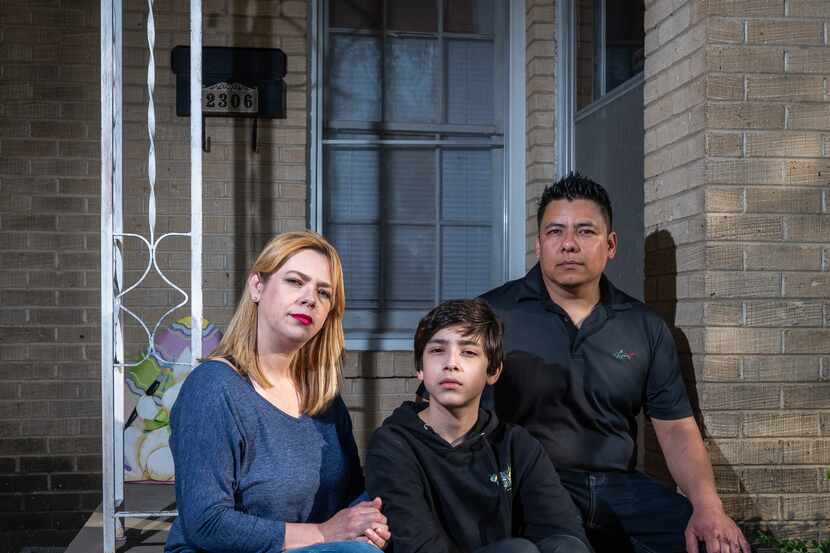 The Rivera family, Blanca Rivera, Hugo Rivera and their son Alexander Rivera, 12, outside...