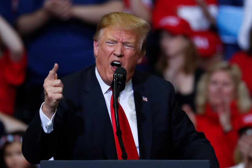  In this March 28, 2019, file photo, President Donald Trump speaks during a rally in Grand...