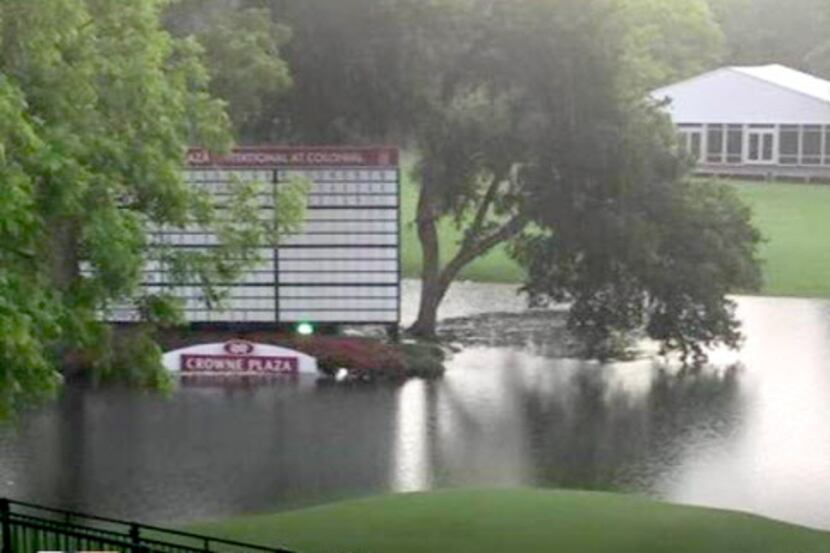 Tweeted photo of high water on the 18th hole at Colonial Country Club in Fort Worth Sunday,...