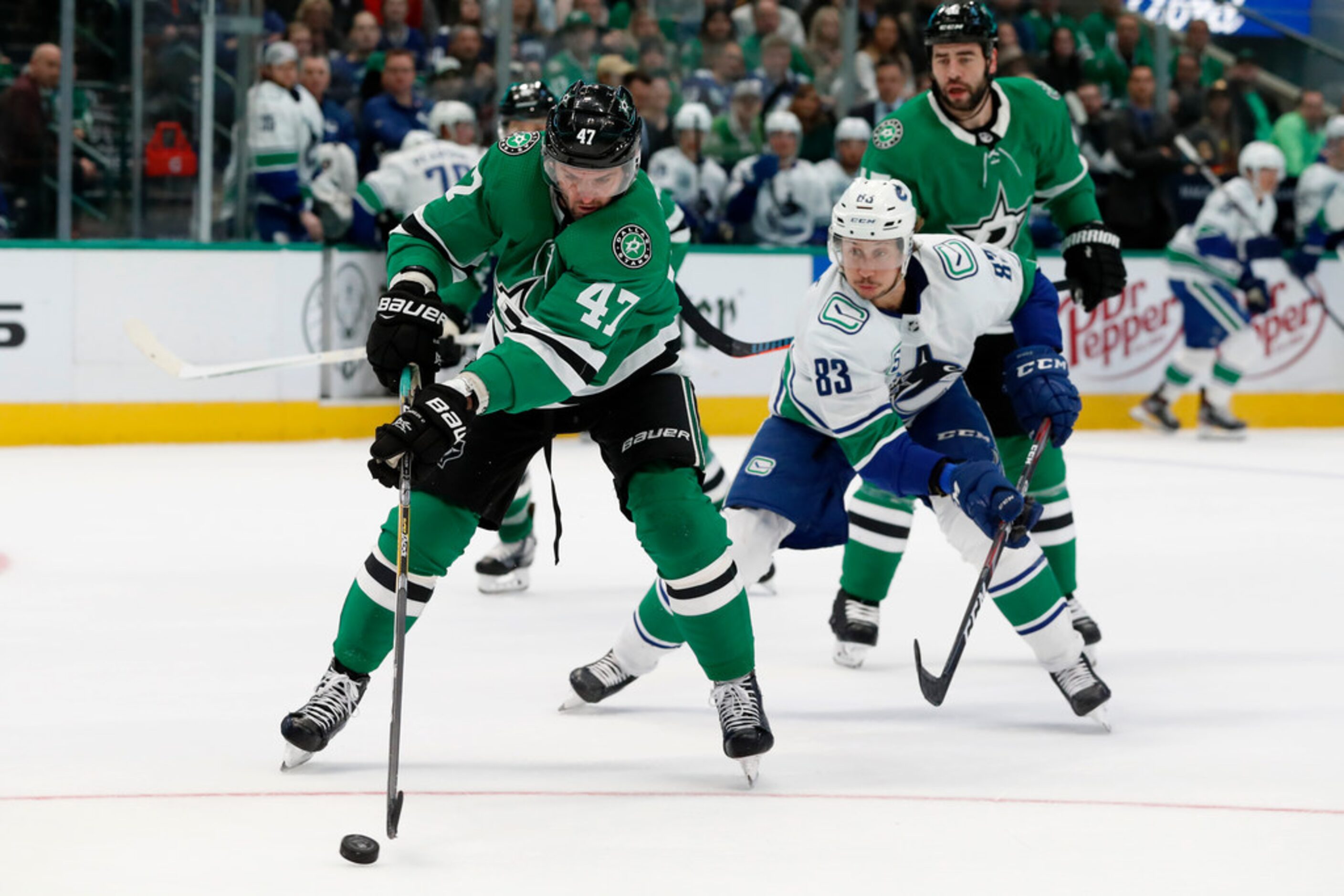 Dallas Stars right wing Alexander Radulov (47) moves to take control of the puck in front of...