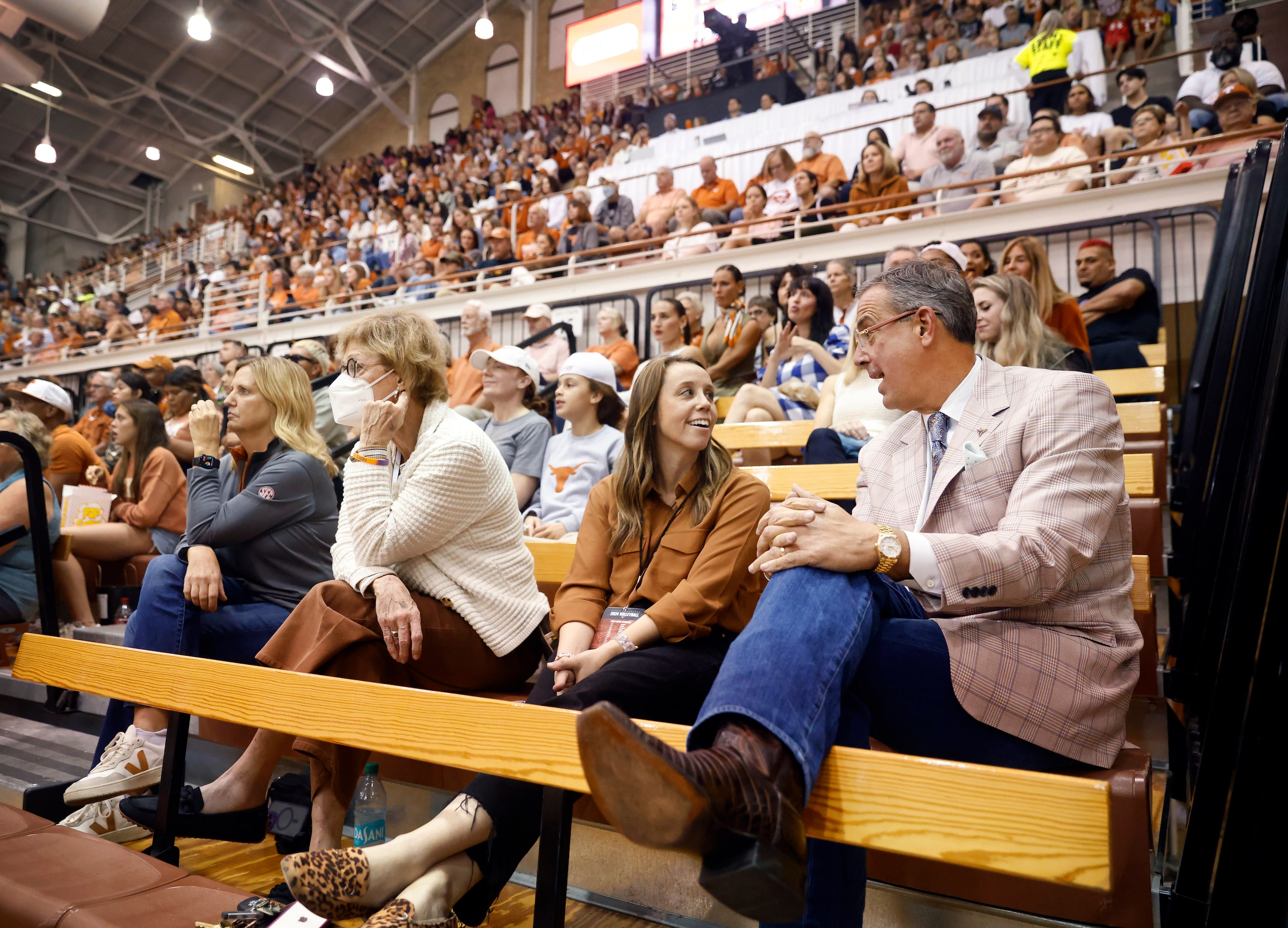 University of Texas Athletic Director Chris Del Conte (right) visits with Sports...