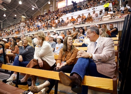 University of Texas Athletic Director Chris Del Conte (right) visits with Sports...