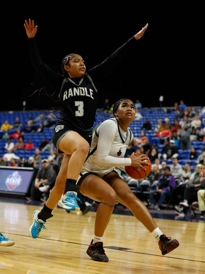 Frisco Liberty Redhawks Keyera Roseby (5) waits for Richmond Randle Lions Jalissa King (3)...