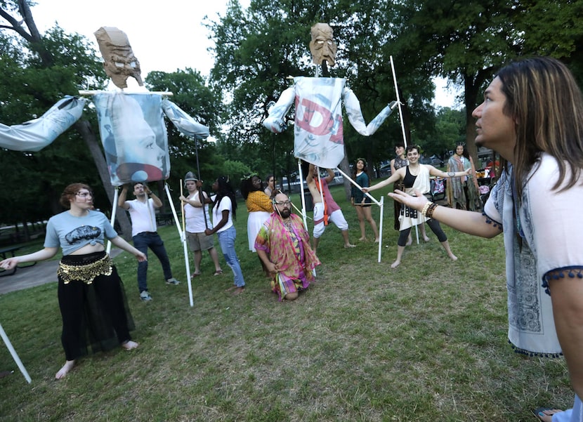 Ryan Matthieu Smith, right, directs the cast of The Bacchae in a rehearsal at Kidd Springs...