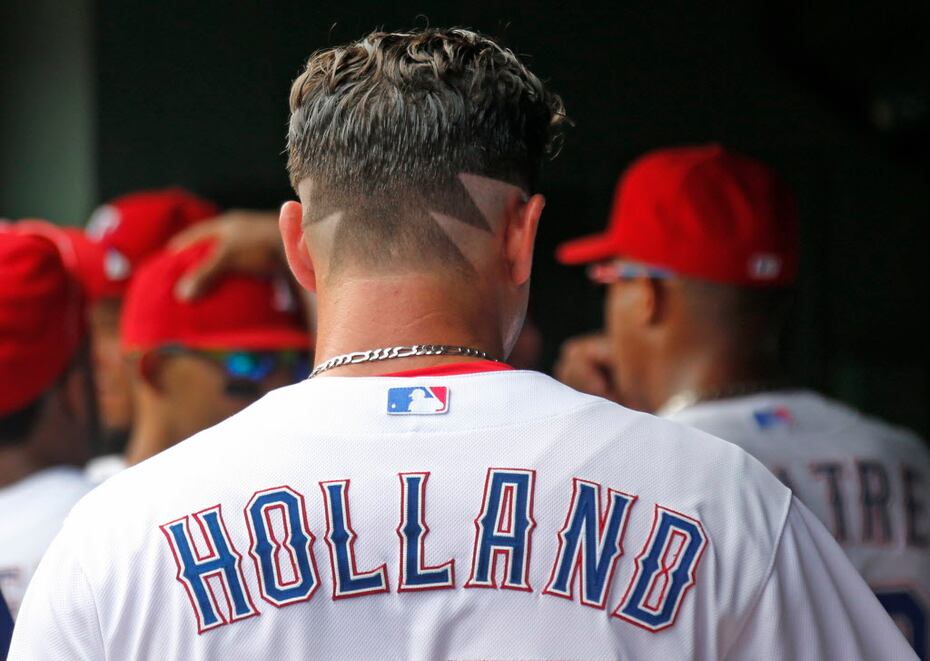 Rocking 'Wild Thing' haircut, Derek Holland throws first shutout