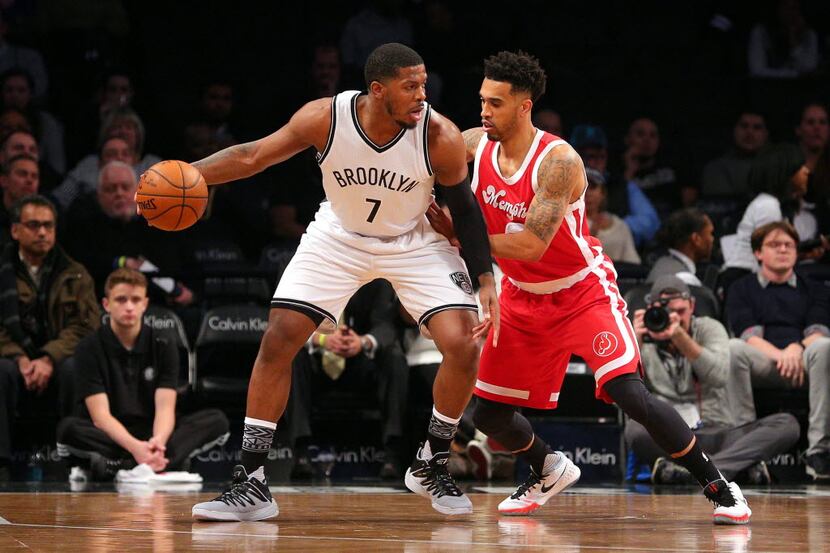 Brooklyn Nets small forward Joe Johnson (7) controls the ball against Memphis Grizzlies...