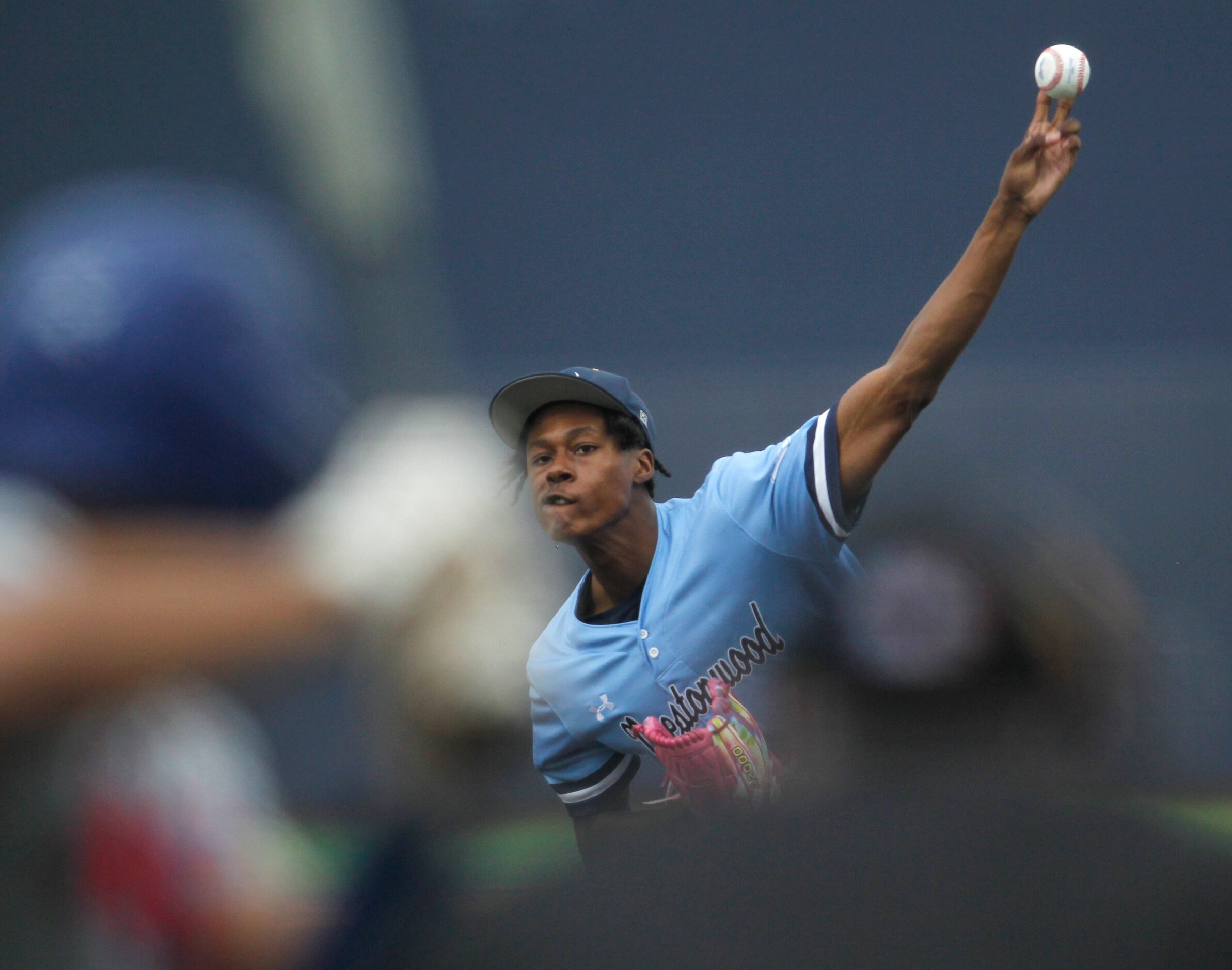  Prestonwood pitcher Xavier Mitchell (22) delivers a pitch to a Parish Episcopal batter...