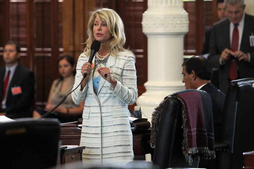 State Senator Wendy Davis filibusters during the final day of the legislative special...
