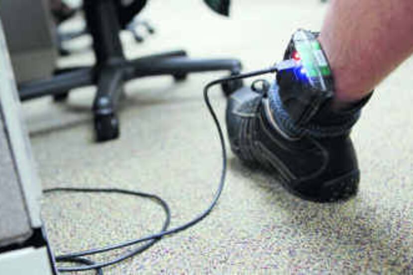  A client has alcohol-monitoring data downloaded from his ankle bracelet at Recovery...