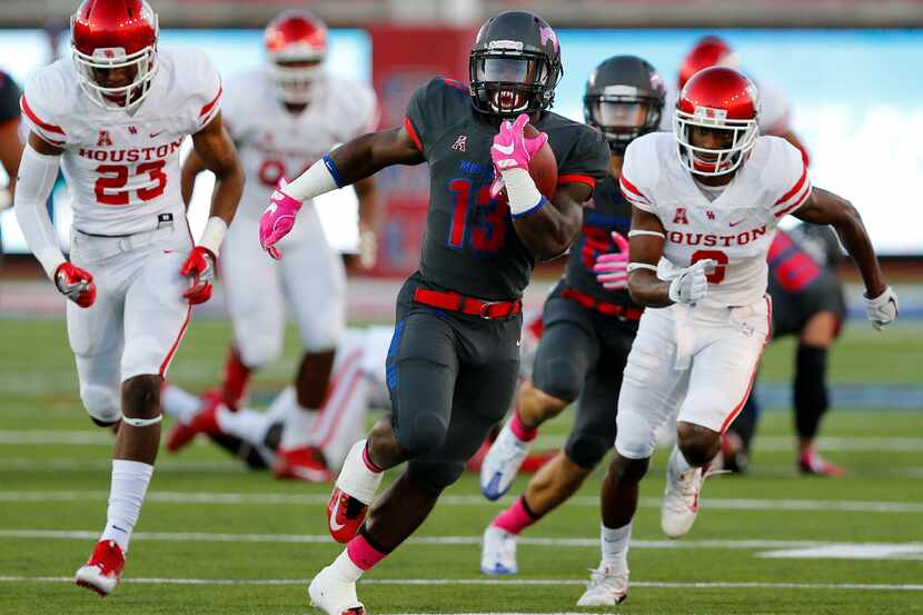 FILE - Southern Methodist Mustangs running back Ke'Mon Freeman (13) breaks away for a big...