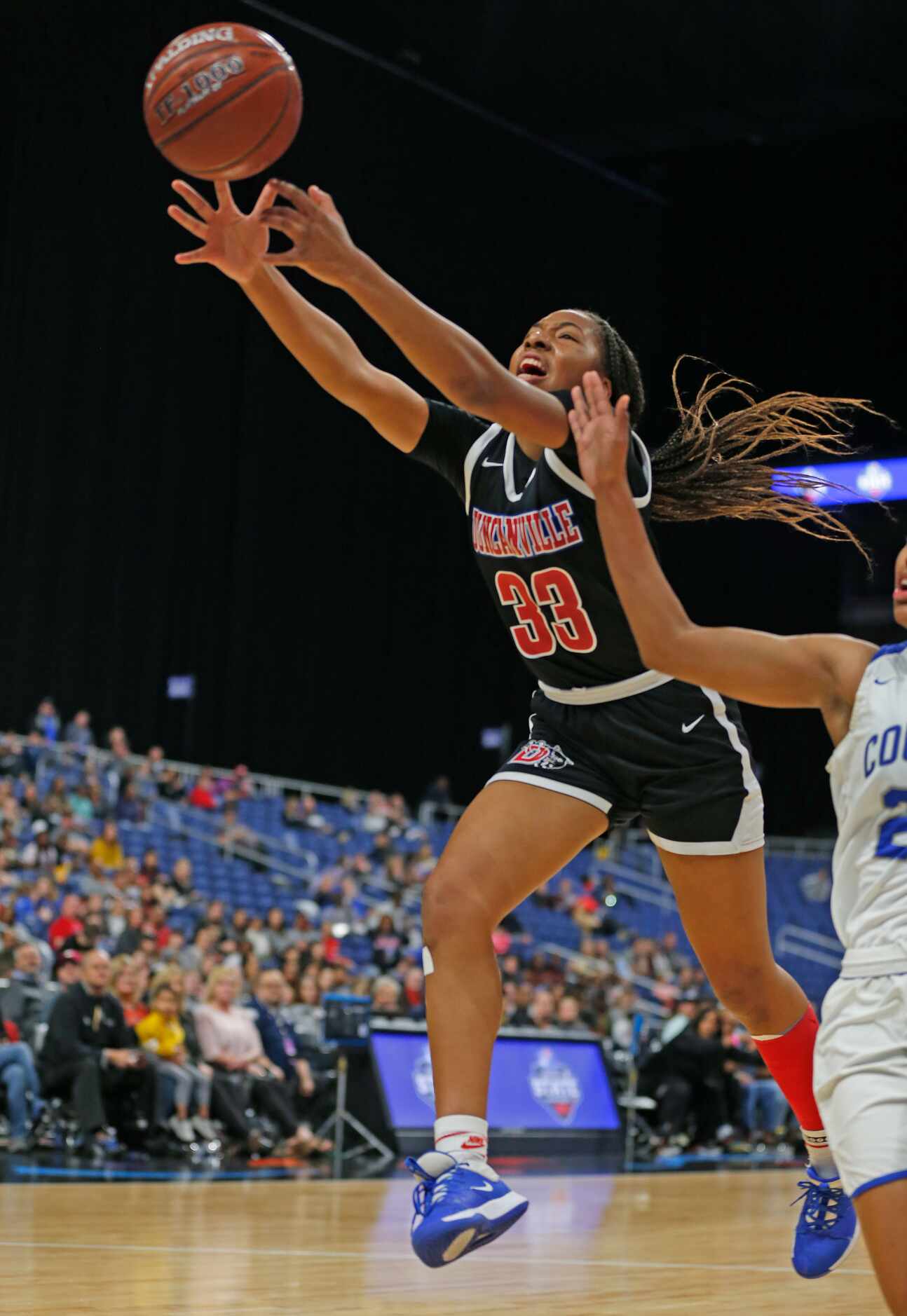 Duncanville guard Nyah Wilson #33 loses control of the ball on a breakaway in a 6A final on ...