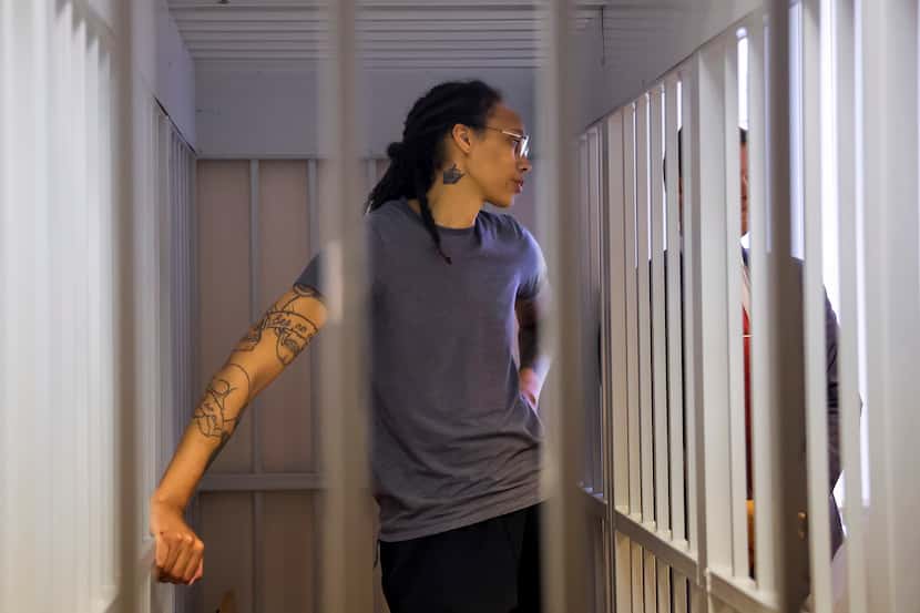 WNBA star and two-time Olympic gold medalist Brittney Griner listens to the verdict standing...