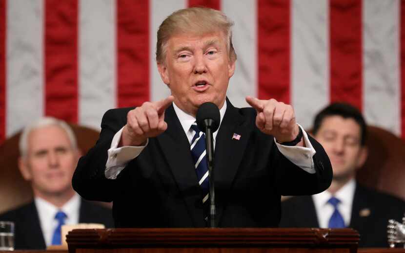 President Donald Trump addresses a joint session of Congress on Capitol Hill in Washington,...