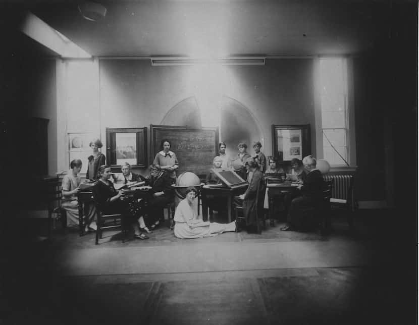 Margaret Harwood sat on the floor for this posed tableau taken on May 19, 1925. Harvia...