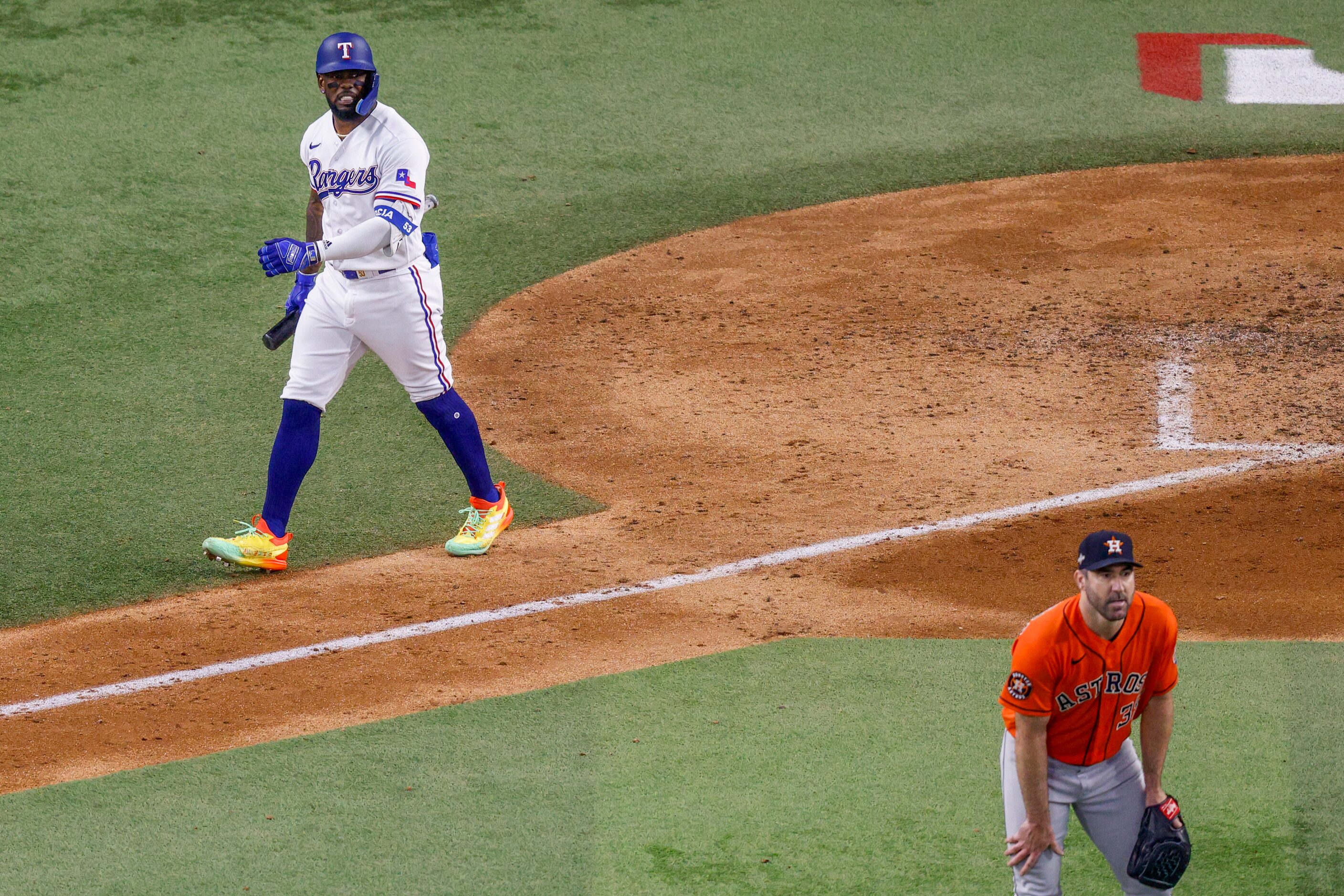 Texas Rangers right fielder Adolis Garcia (53) watches his three-run home run off of Houston...