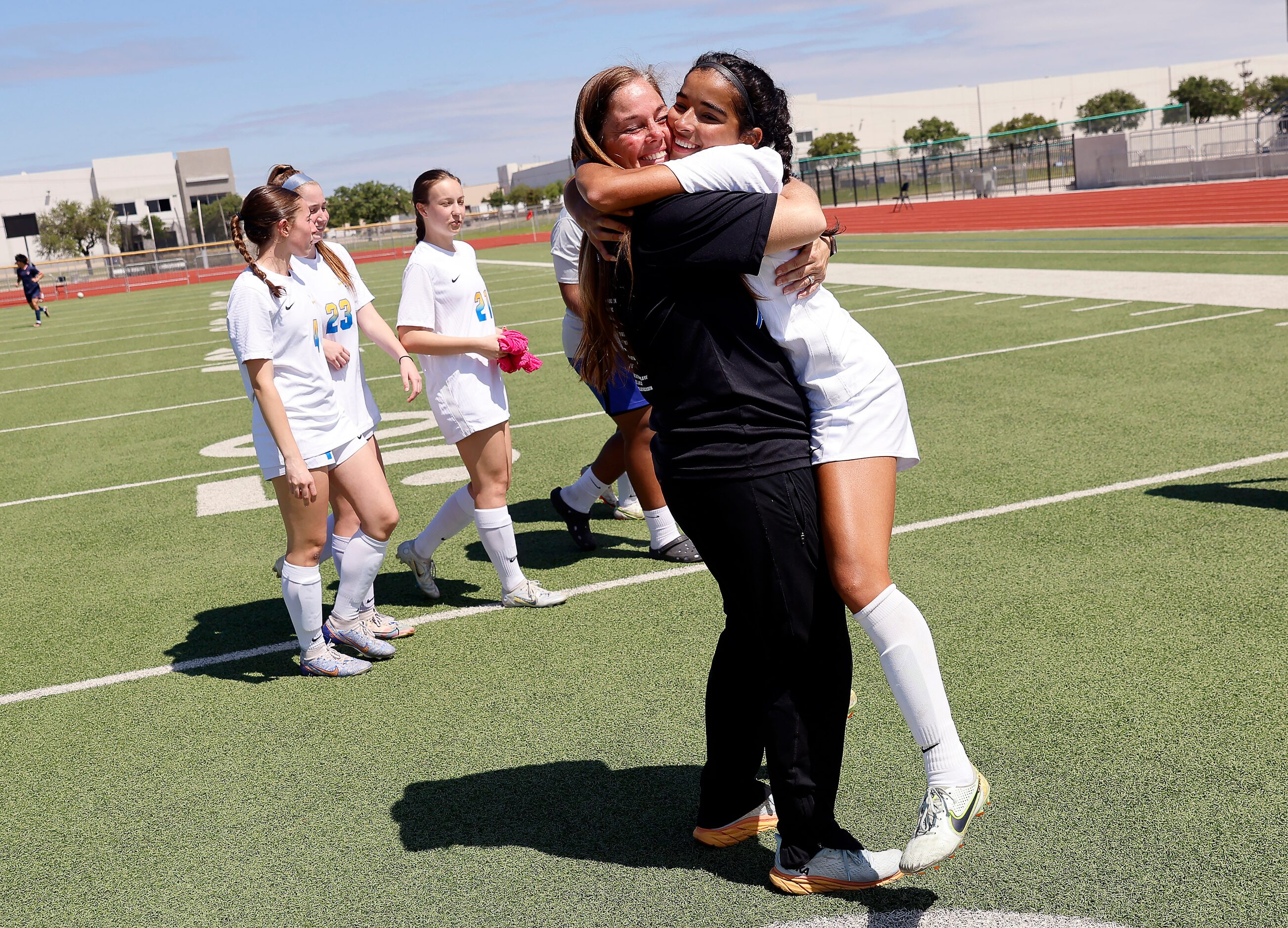 Frisco head coach Jaime Leraas hugs senior captain Luci Rodriguez after winning the Class 5A...