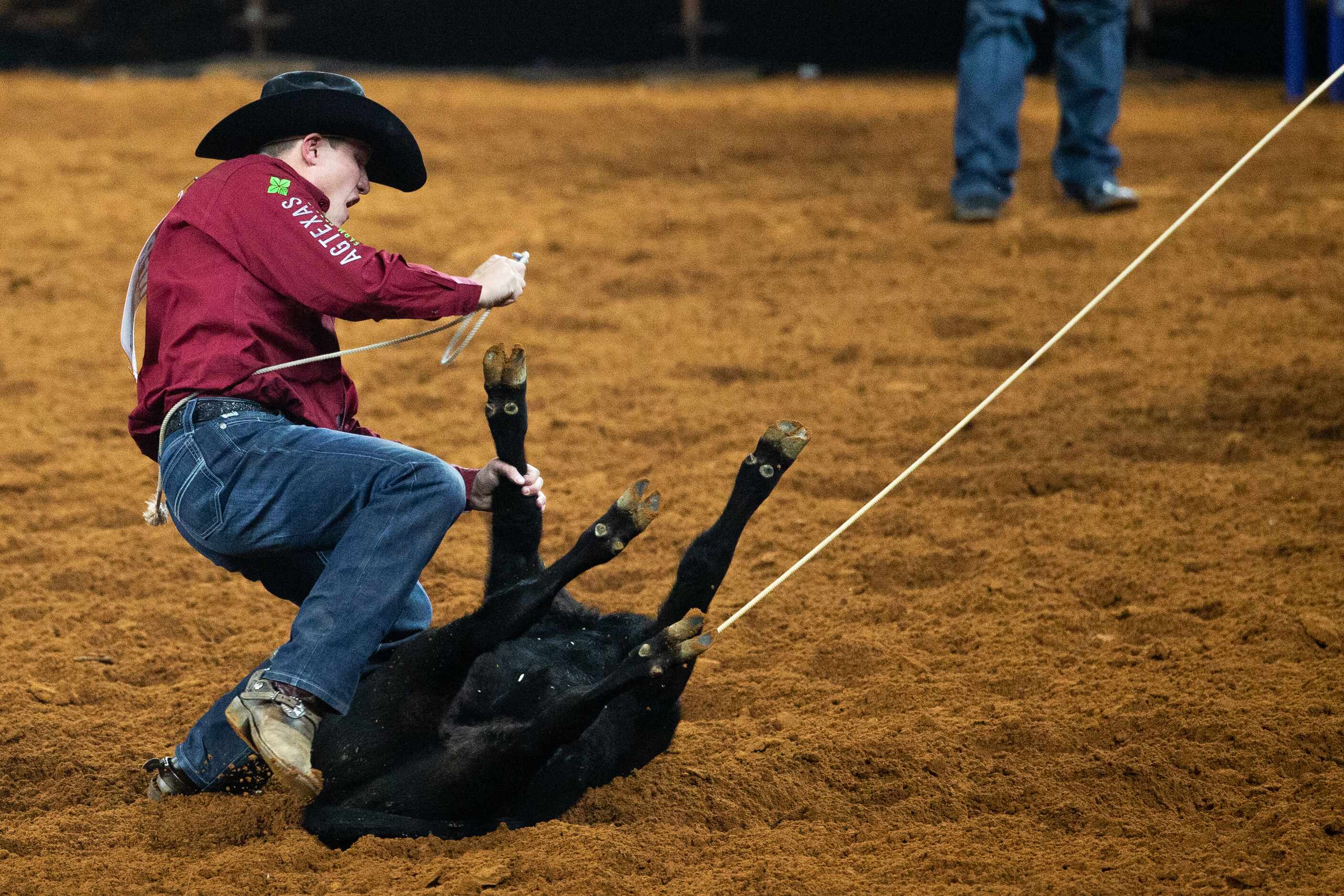 PRCA Tie Down Roping contestant Marty Yates wins the first round of his event with a time of...