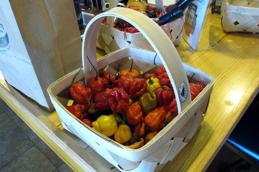 This Dec. 12, 2013 photo shows Carolina Reaper peppers at Ed Currie's store in Fort Mill,...