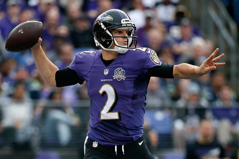 BALTIMORE, MD - DECEMBER 13:  Quarterback Jimmy Clausen #2 of the Baltimore Ravens throws a...