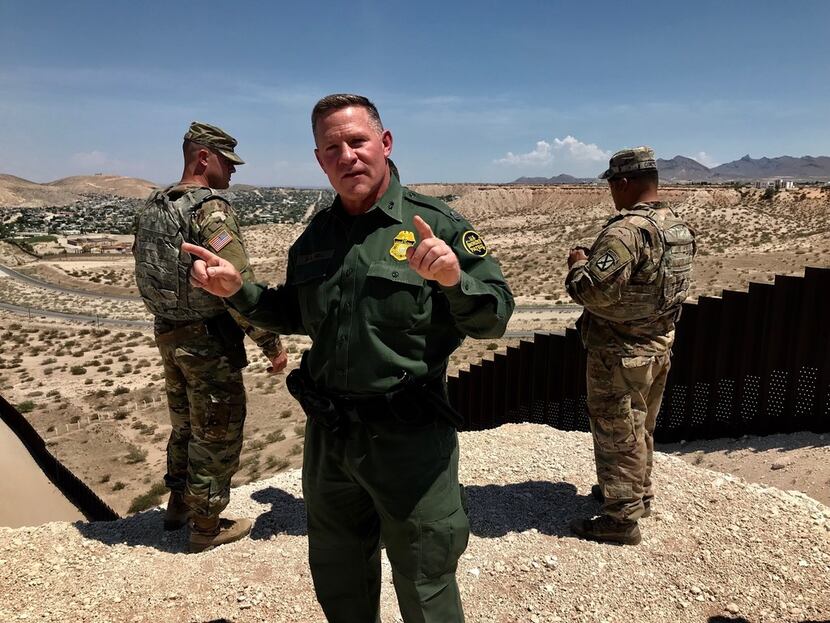 Aaron Hull, Border Patrol Chief of the El Paso sector, answers questions along the border...