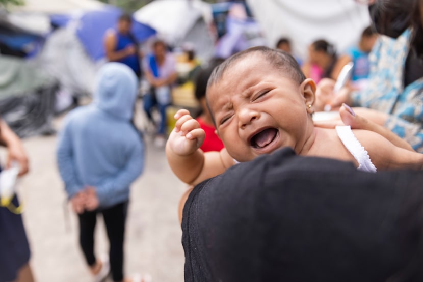 Faviola Vásquez, 26, from Honduras holds her two-month-old daughter Ashley Berenice Vásquez...