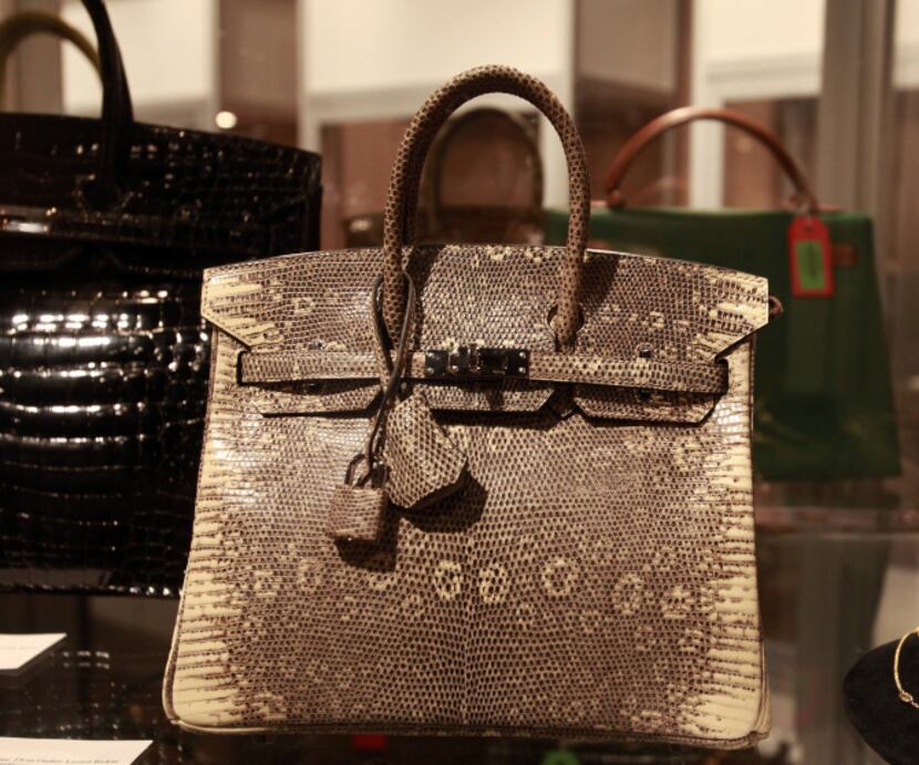 Auctioneers expect a Hermés ombre lizard Birkin bag to draw big offers.