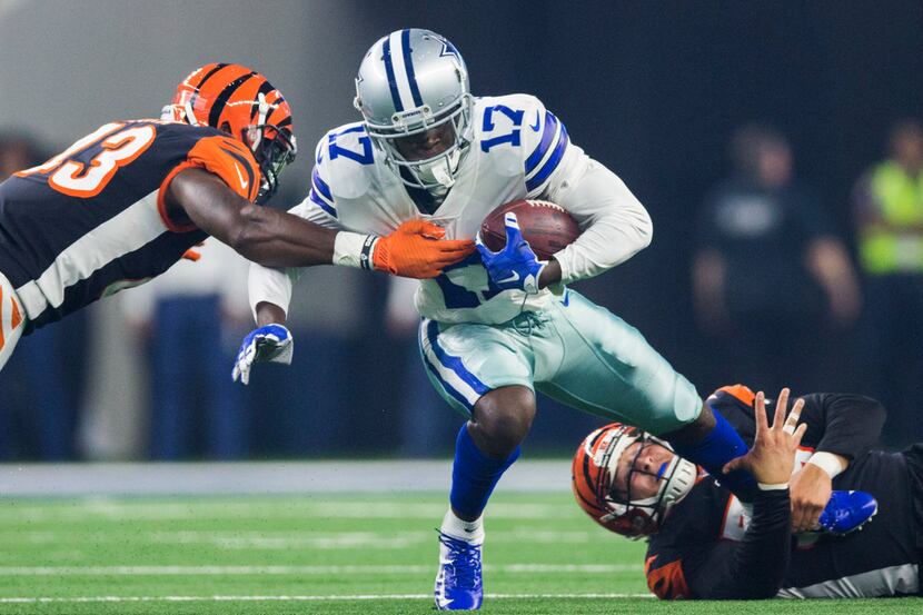 Dallas Cowboys wide receiver Allen Hurns (17) is tackled by Cincinnati Bengals defensive...