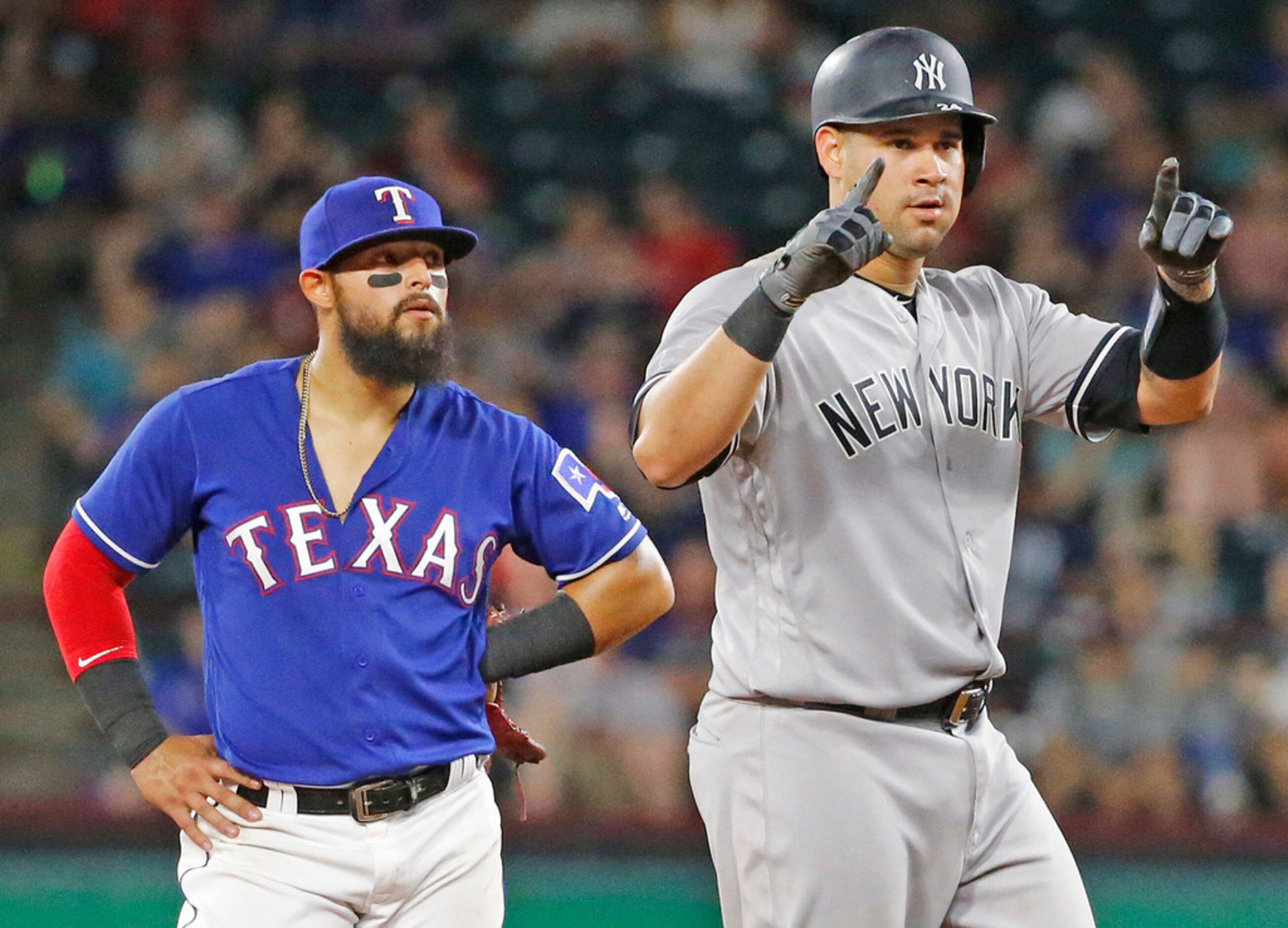 New York Yankees catcher Gary Sanchez (24) signals to the dugout after his double in the...