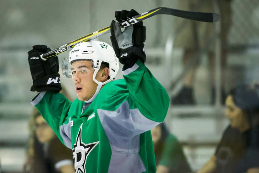 Defenseman Gavin Bayreuther waits his turn during a drill on the first day of Dallas Stars...