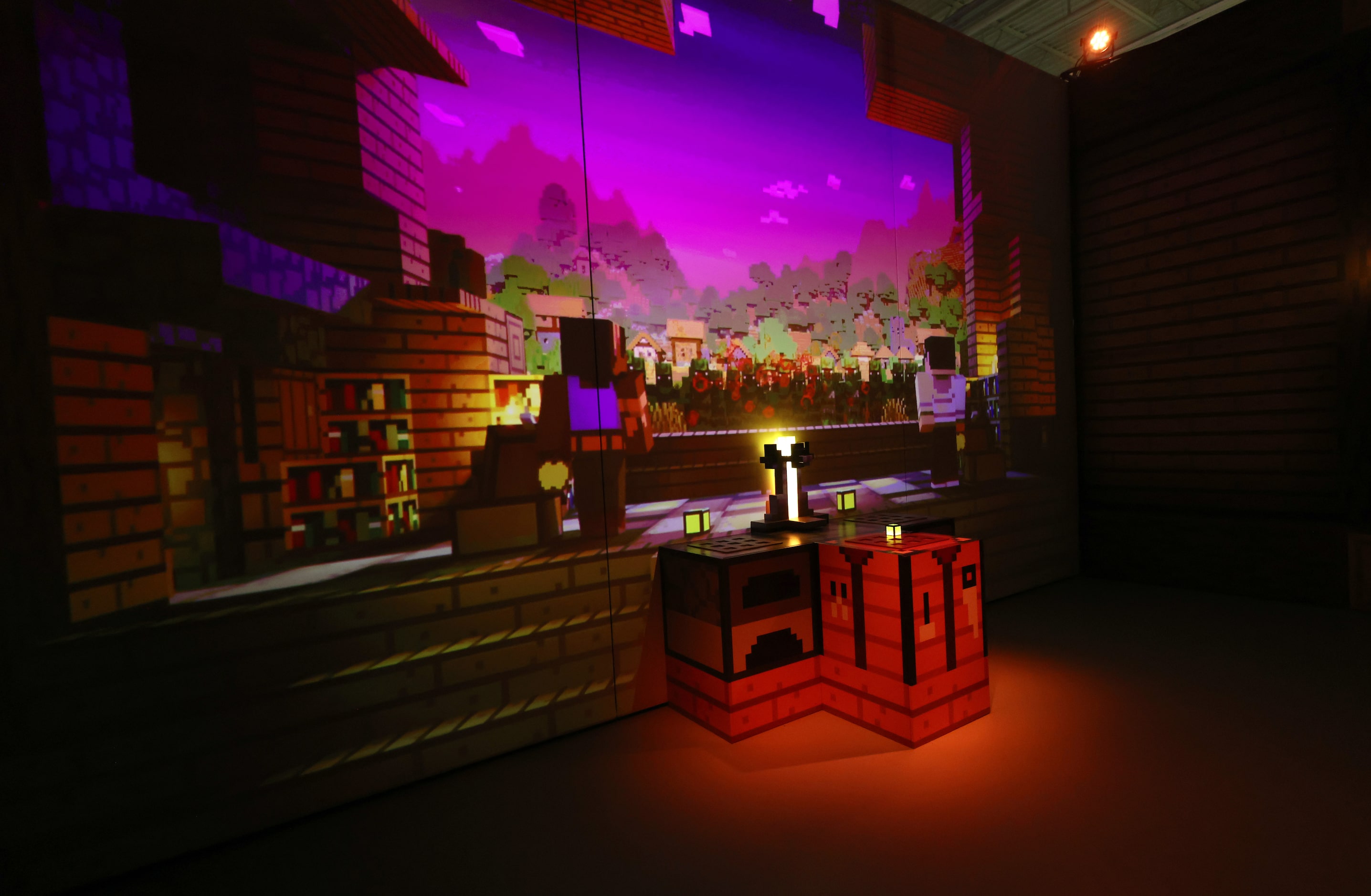 A section of a maze within one of the rooms awaits explorers at Minecraft Experience:...