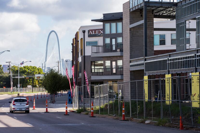 The Alexan West Dallas apartments under construction on on Fort Worth Avenue are already 20...