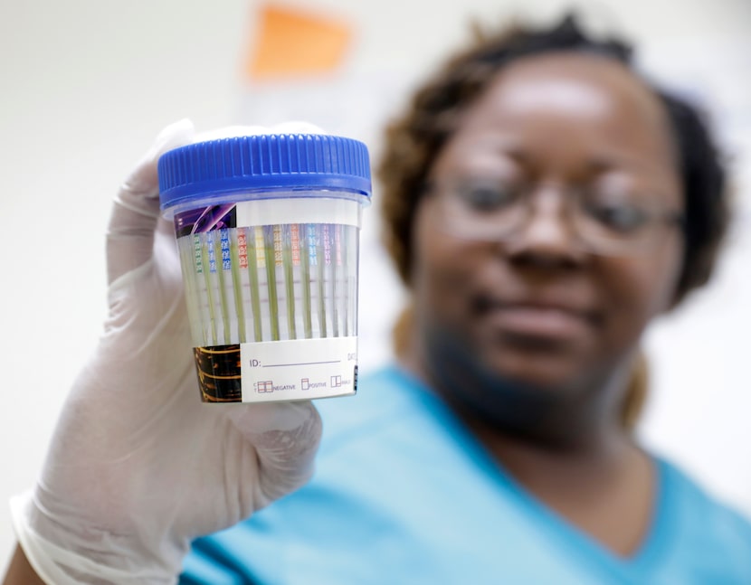 Nexus Recovery Center detox nurse manager LaQuitha Patton reads results from a drug test...