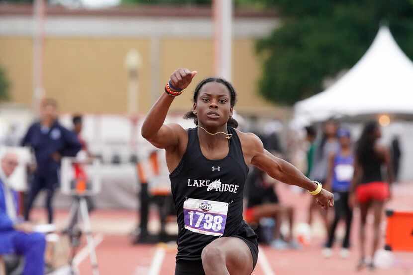 Mansfield Lake Ridge senior Jasmine Moore makes her first attempt in the Class 6A triple...