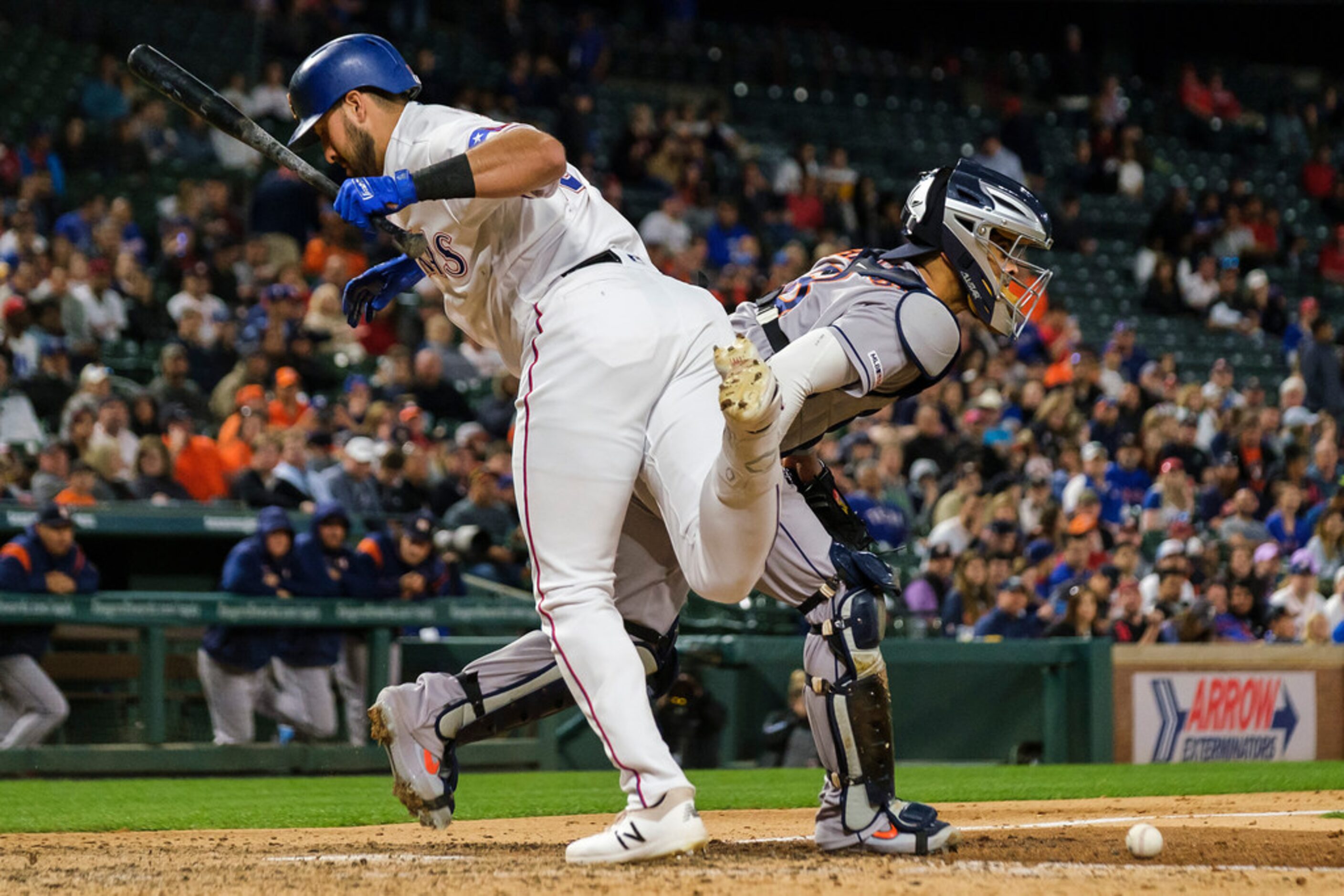 Texas Rangers outfielder Joey Gallo gets away from a pitch as Houston Astros catcher...