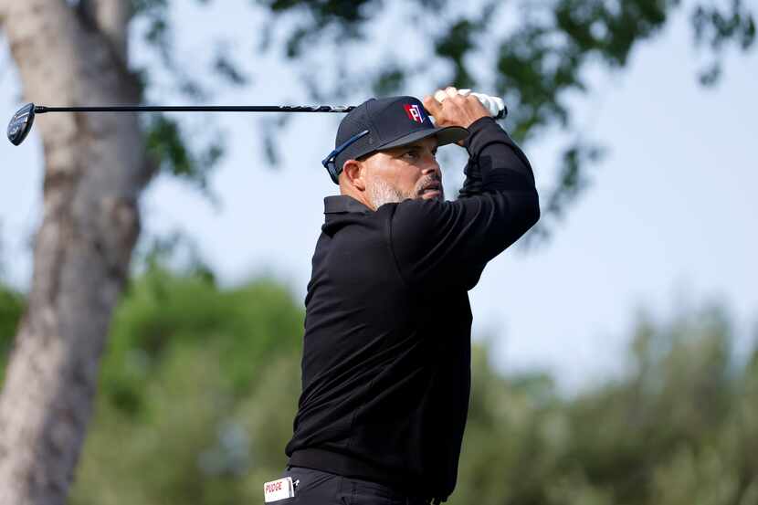 Former Texas Rangers Hall of Fame catcher Ivan ‘Pudge’ Rodriguez hits his drive on No. 15...