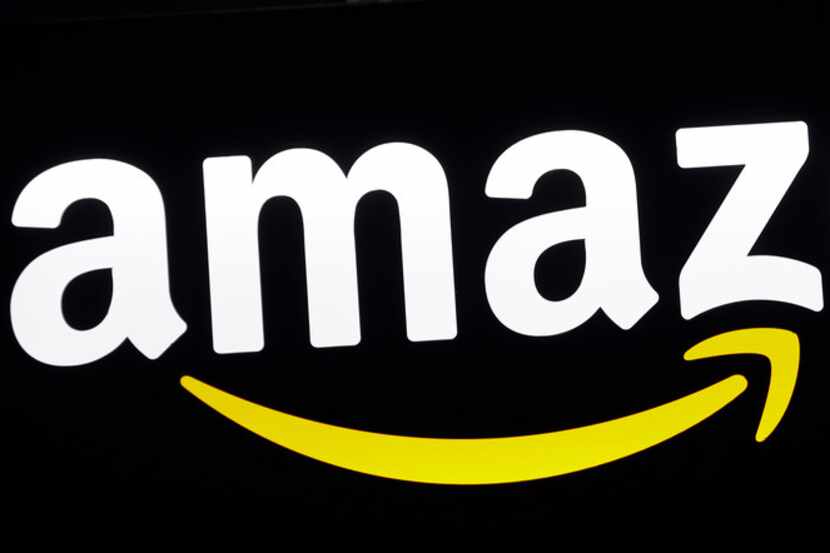 FILE - This Aug. 7, 2017, file photo shows an Amazon sign at a store in Hialeah, Fla. Just...