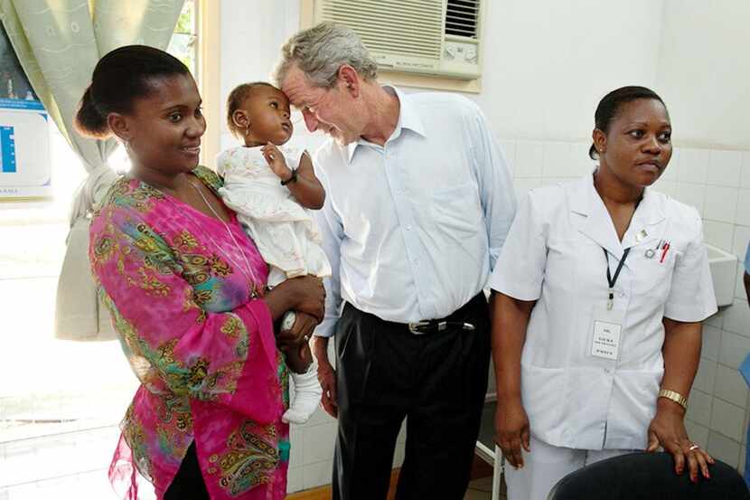 Former President George W. Bush visited an AIDS Clinic in Dar es Salaam, Tanzania, on World...