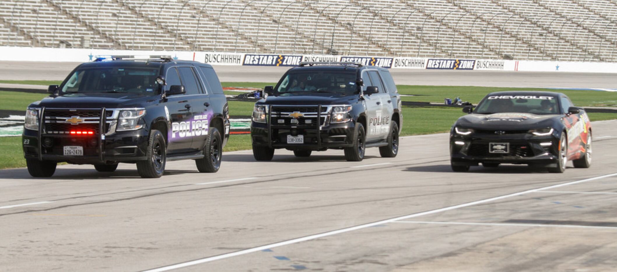 Jared Leto has a police escort as he stops by the Texas Motor Speedway in Fort Worth...