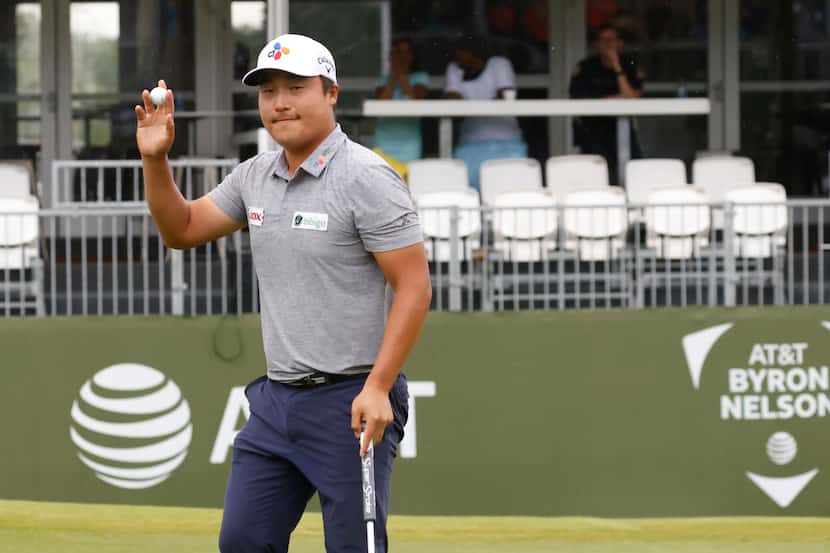 Kyoung-Hoon Lee sinks a birdie on the 17th hole during round 4 of the AT&T Byron Nelson at...
