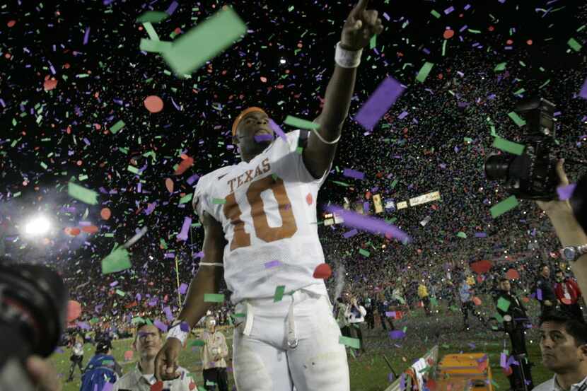 Texas quarterback Vince Young celebrates Texas beat Southern California 41-38 in the Rose...