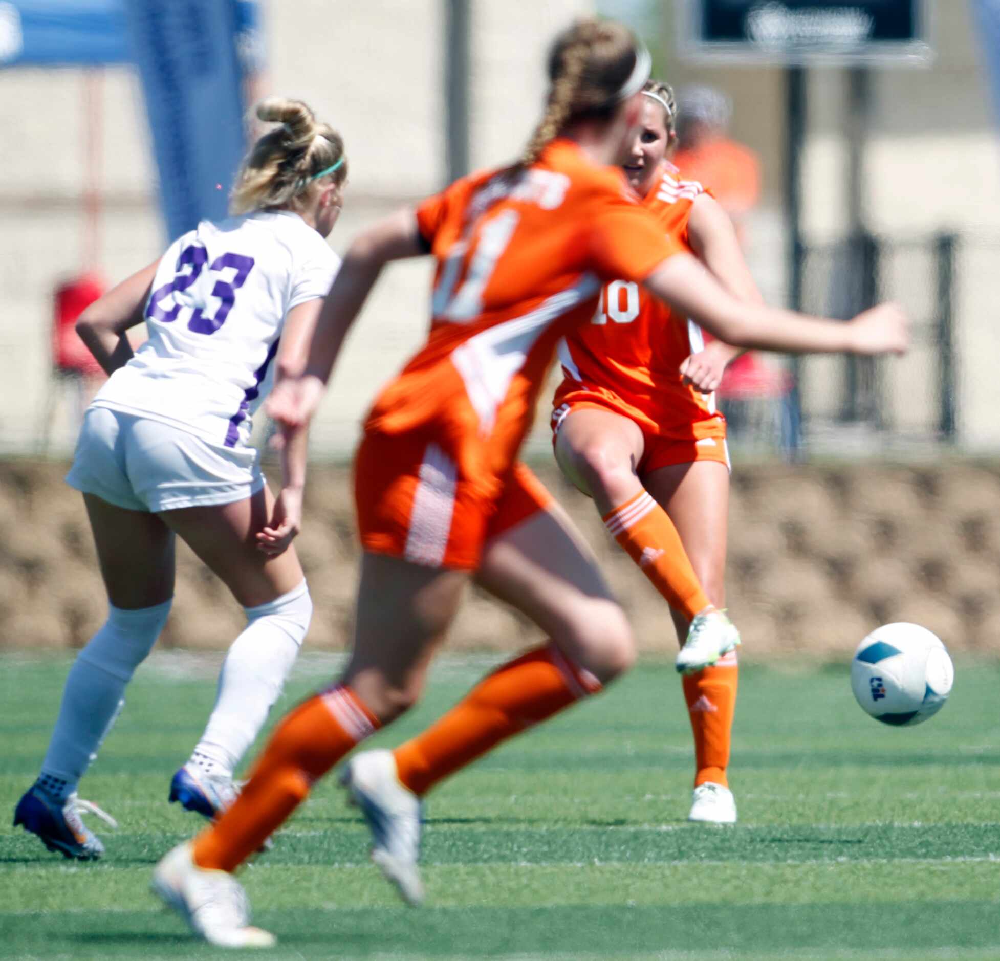 Celina's Mia Norman (10) passes ahead to Madi Vana during first half action against Boerne....