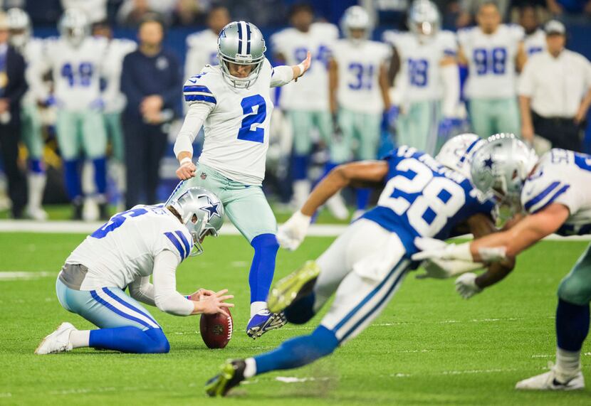 Dallas Cowboys kicker Brett Maher (2) attempts a field goal, which was deflected and run...