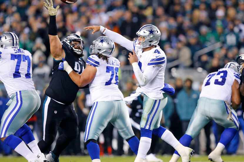 Dallas Cowboys quarterback Dak Prescott (4) fires a pass downfield against the Philadelphia...